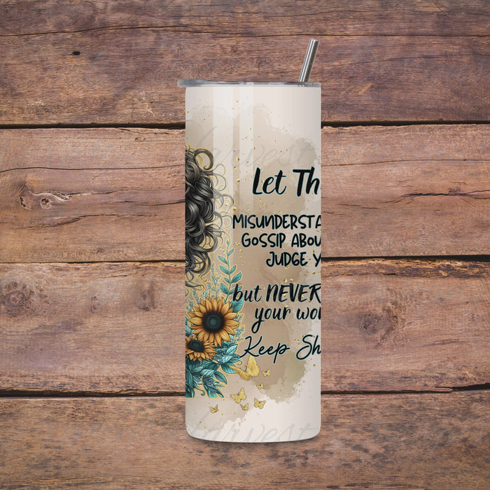 Rotating view of a 20oz skinny tumbler featuring the ‘Let Them’ Blue Floral Wrap design. The tumbler shows a stylish woman with curly hair, glasses, a blue leopard-print headband, sunflowers, and butterflies. The video highlights the full wrap design for sublimation crafting.